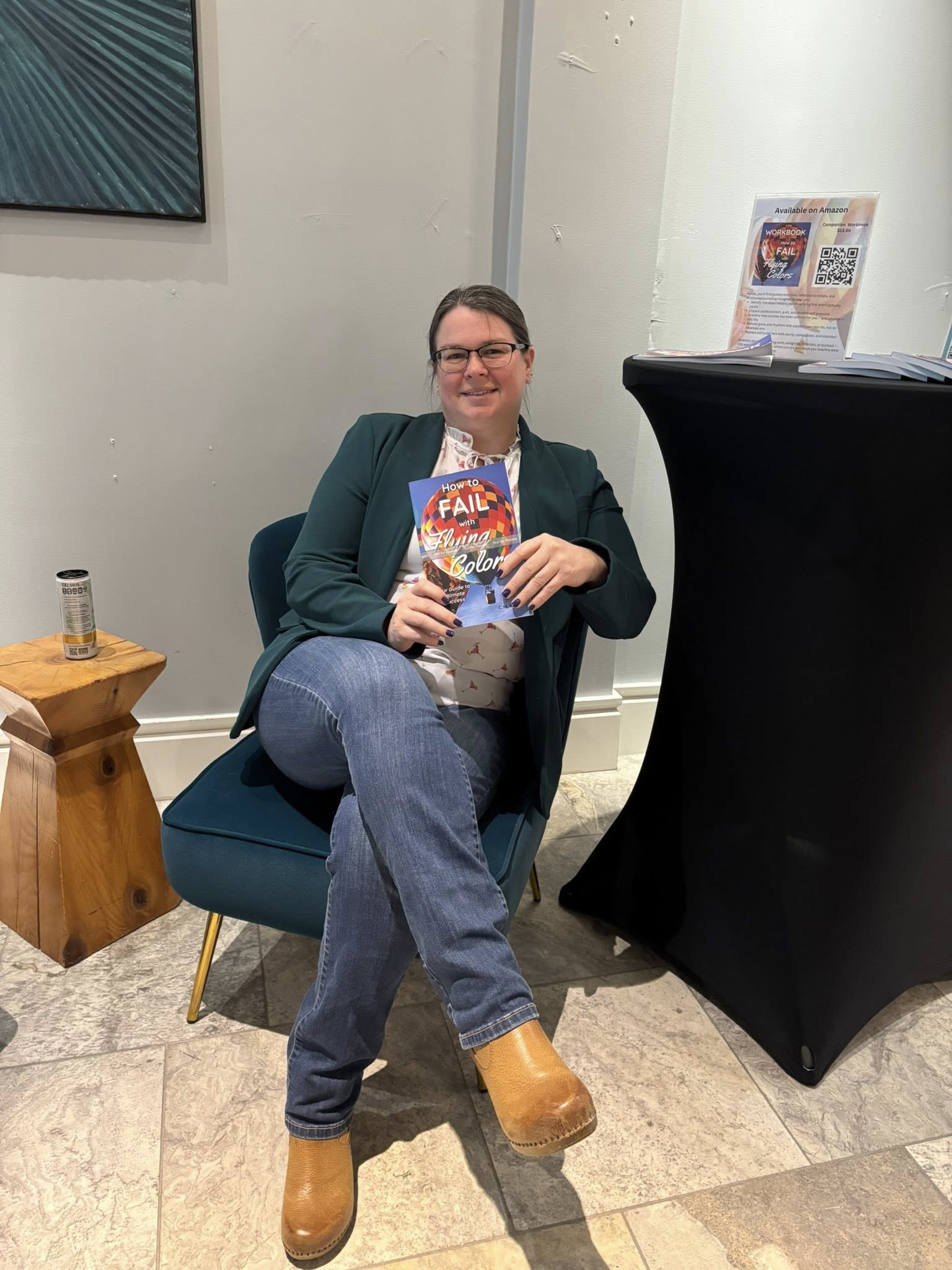 chani author event holding book